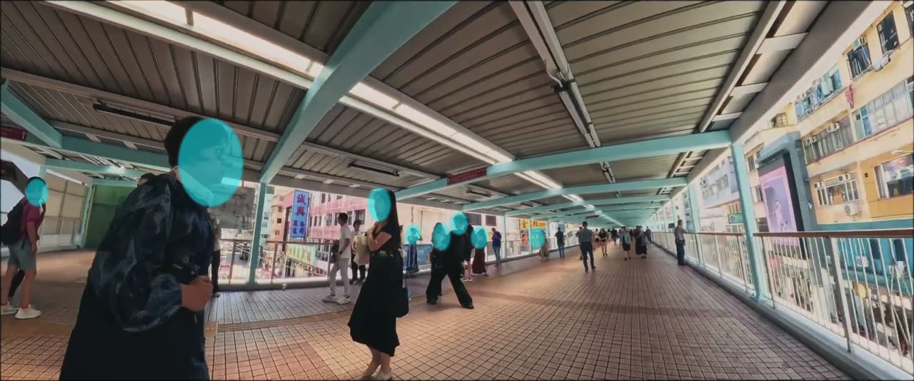 Mask overlay view: cyan shapes over every face on a busy footbridge